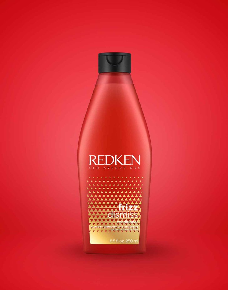 Redken Frizz Dismiss Conditioner Röd bakgrund